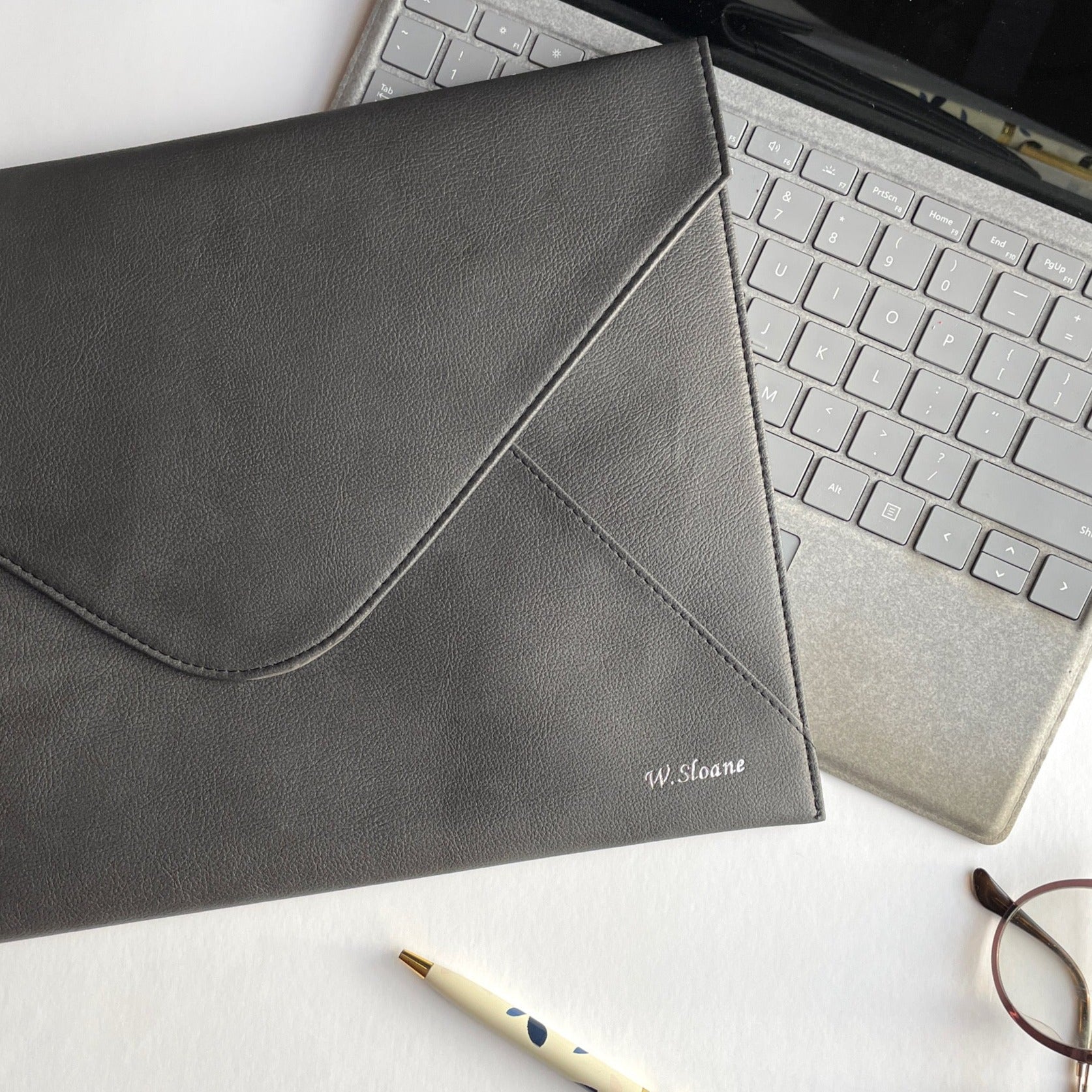 Black Laptop Sleeve with silver foil personalization