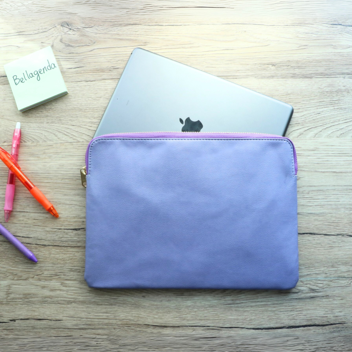 Front view of lavender leather tablet sleeve with zipper for women