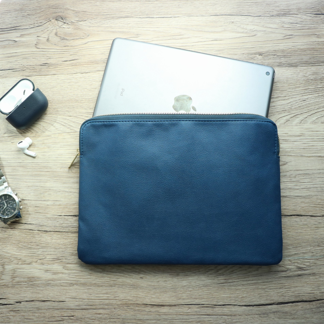 Front view of navy leather travel bag with zipper for men