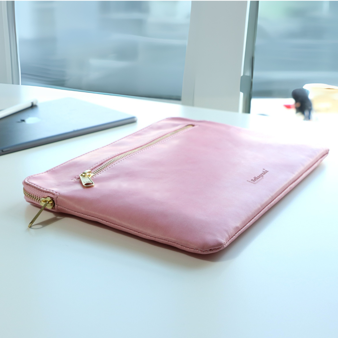 Tablet sleeve on work desk with pen and notebook, birthday gift idea